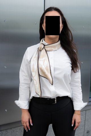 Original photograph of a model wearing a Grivette Design garment, before AI editing