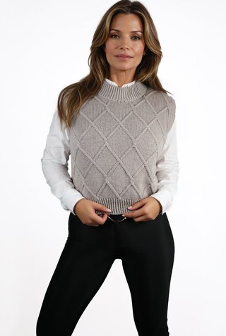 Vest with braid detail knitted from Grivette Design's knitting pattern no 009